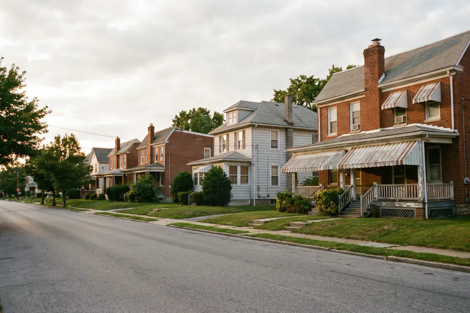 Brick twin homes along an established street in Delaware County Pennsylvania
