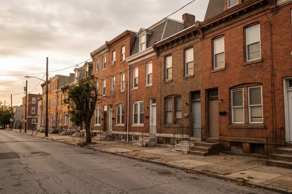 Older rowhomes on a Grays Ferry residential street