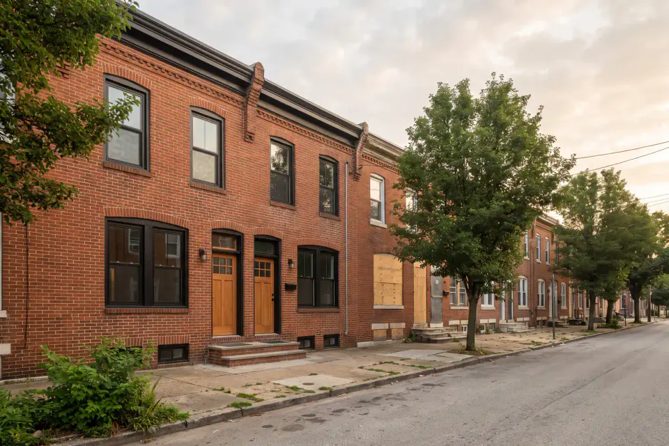 Older brick rowhomes on a reinvesting Mantua block